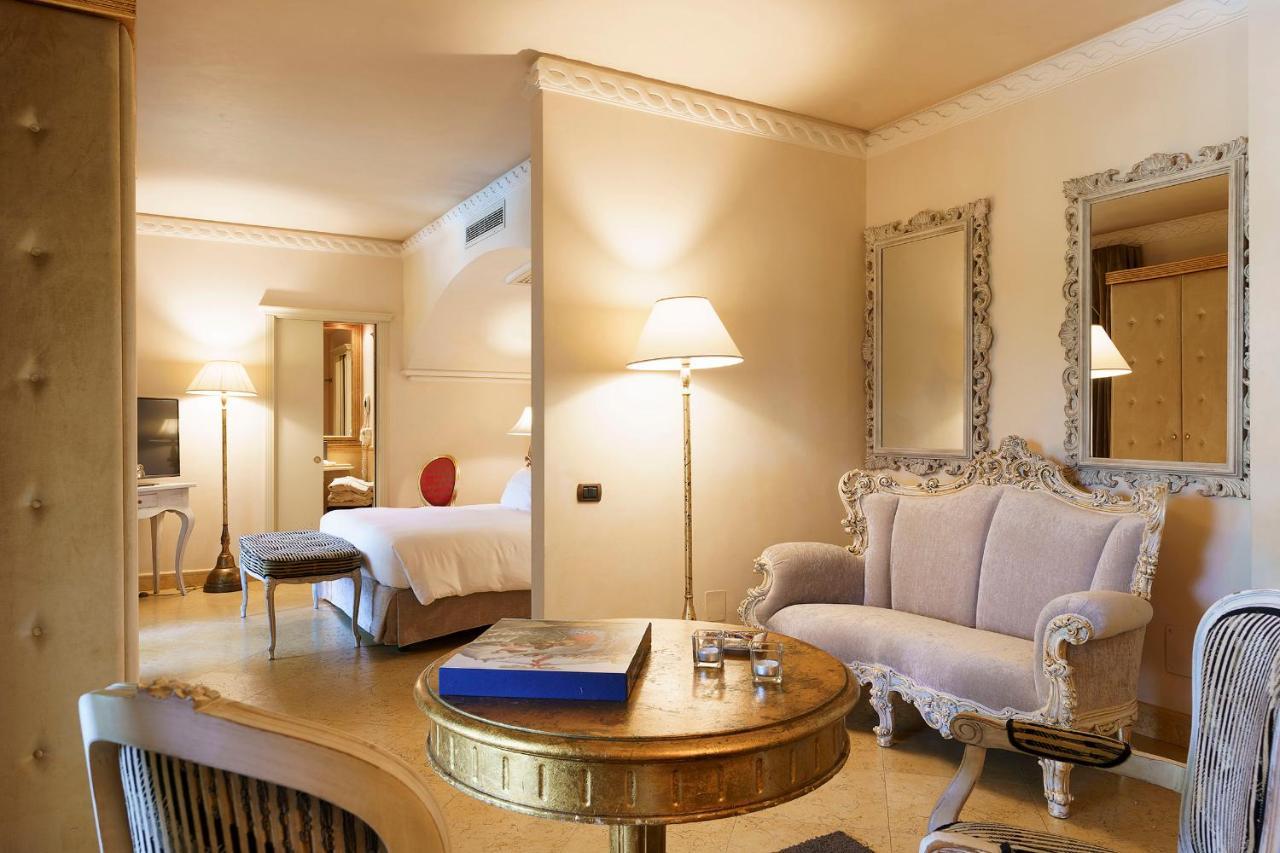 罗曼诺宫豪华酒店 卡塔尼亚 外观 照片 A suite at the Hotel Excelsior