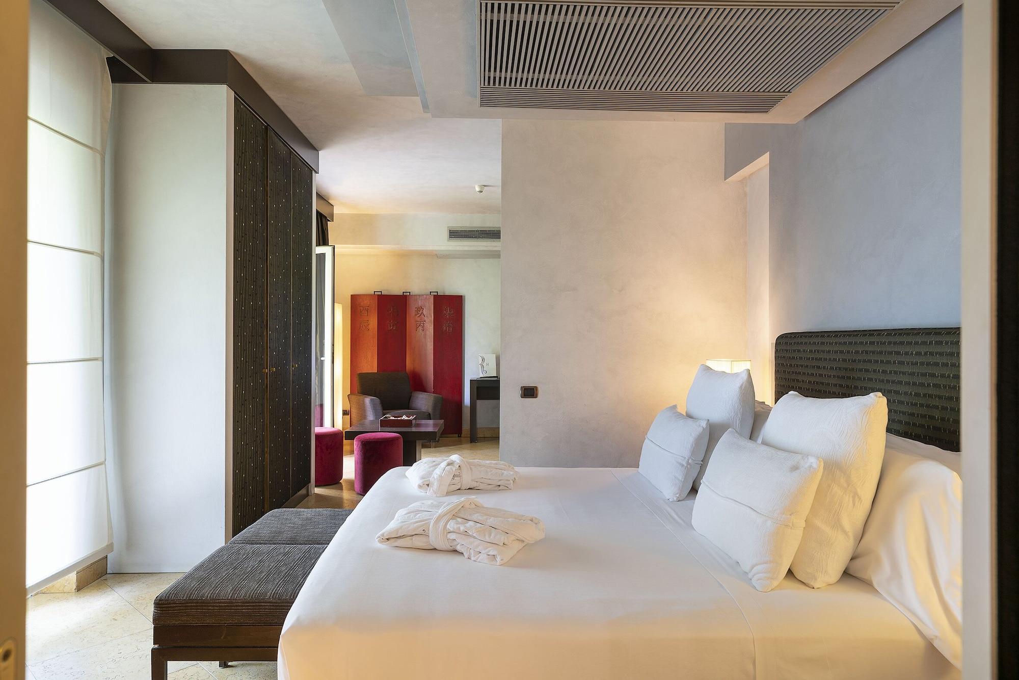 罗曼诺宫豪华酒店 卡塔尼亚 外观 照片 A room at the hotel