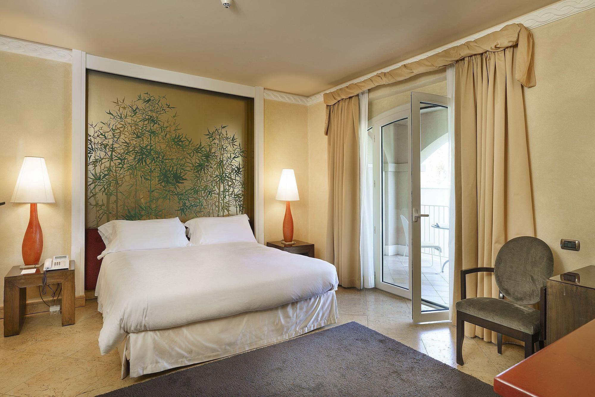 罗曼诺宫豪华酒店 卡塔尼亚 外观 照片 A bedroom at the hotel