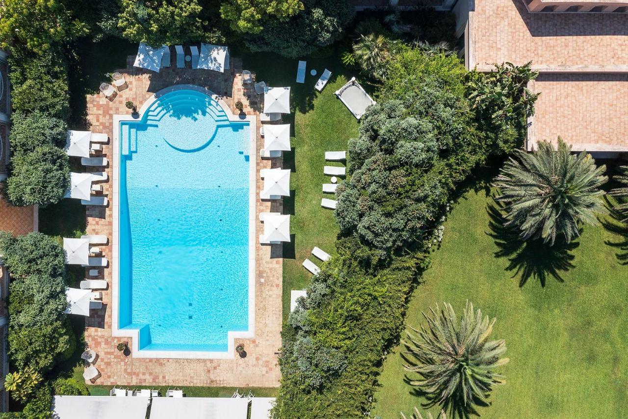罗曼诺宫豪华酒店 卡塔尼亚 外观 照片 Aerial view of the pool