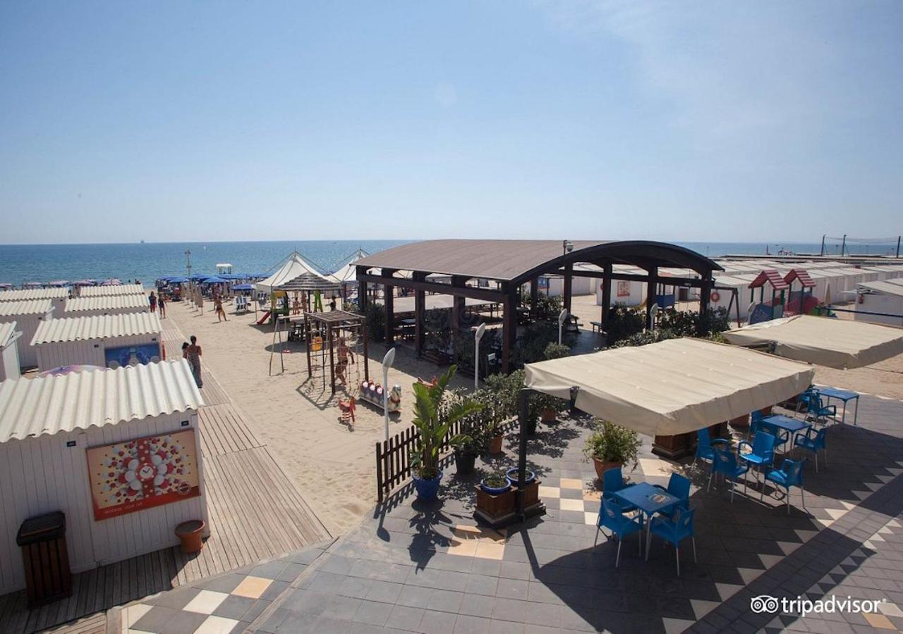 罗曼诺宫豪华酒店 卡塔尼亚 外观 照片 The beach at the hotel