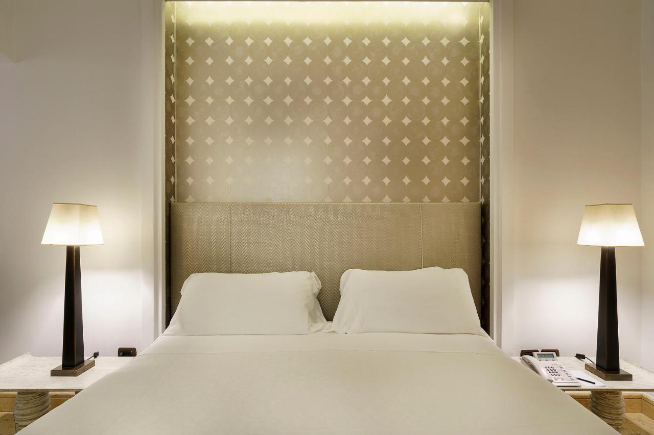罗曼诺宫豪华酒店 卡塔尼亚 外观 照片 A bedroom at the hotel