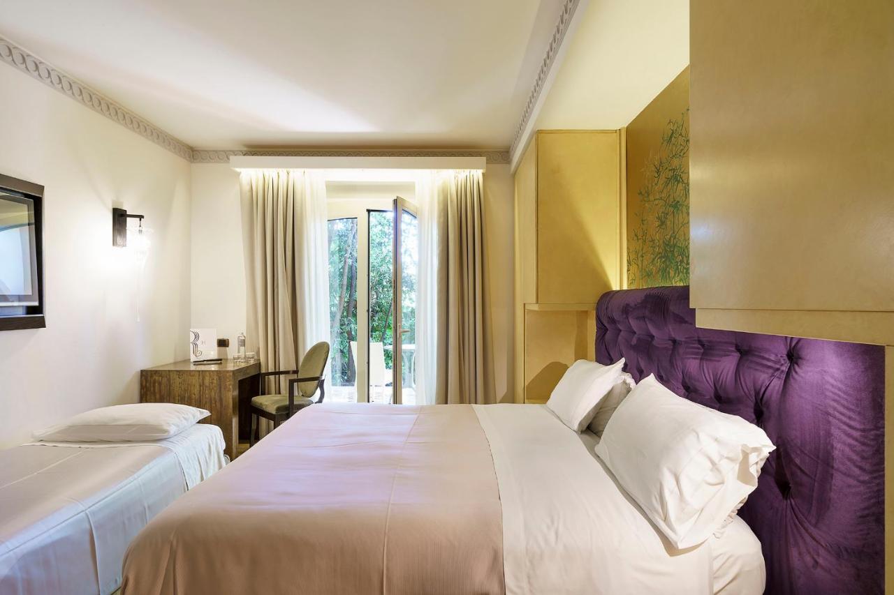 罗曼诺宫豪华酒店 卡塔尼亚 外观 照片 A room at the hotel