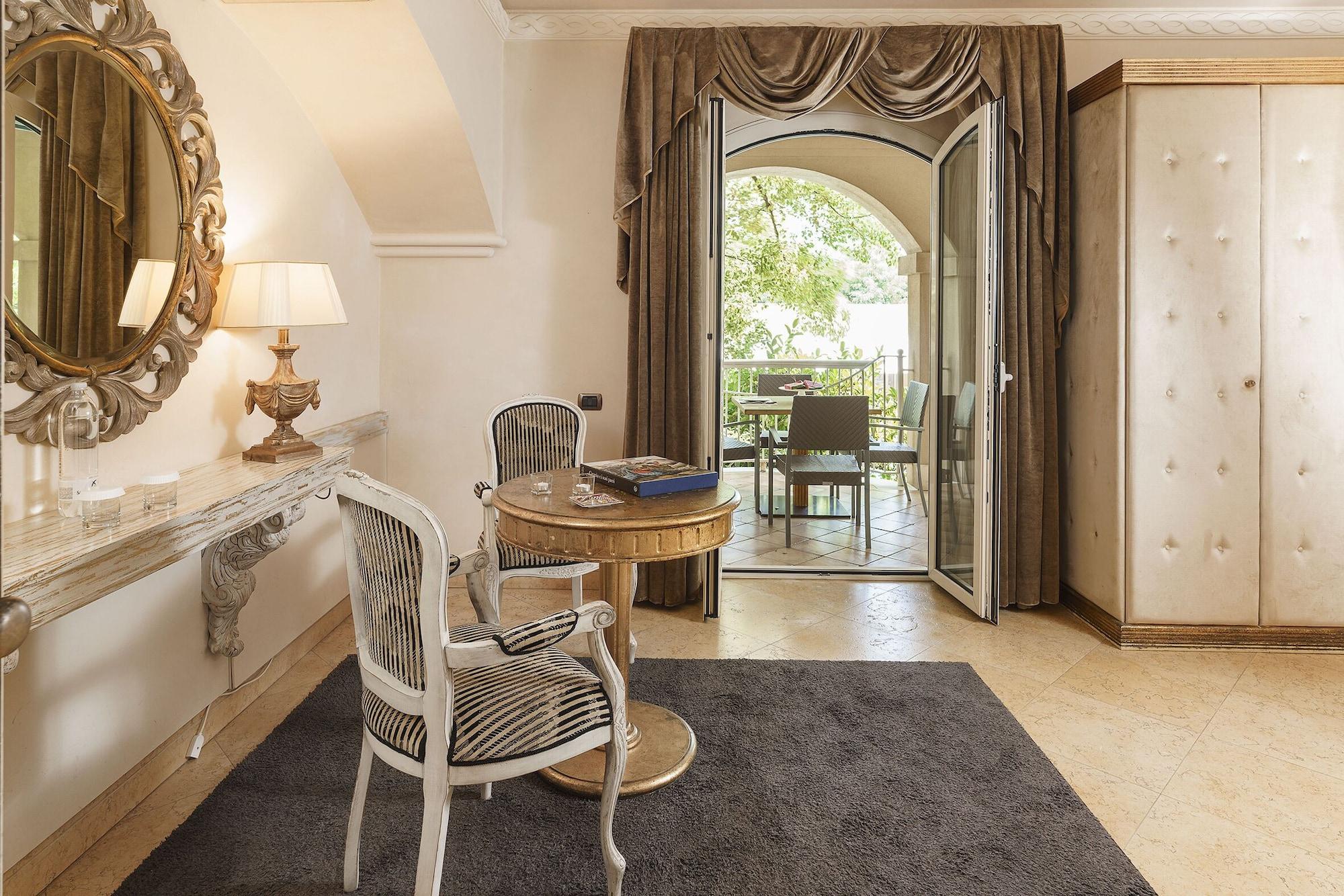 罗曼诺宫豪华酒店 卡塔尼亚 外观 照片 A room at the hotel